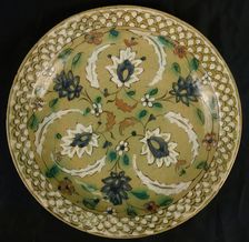 Dish with Floral Designs on an Olive Background, Iran, 16th-17th century. Creator: Unknown