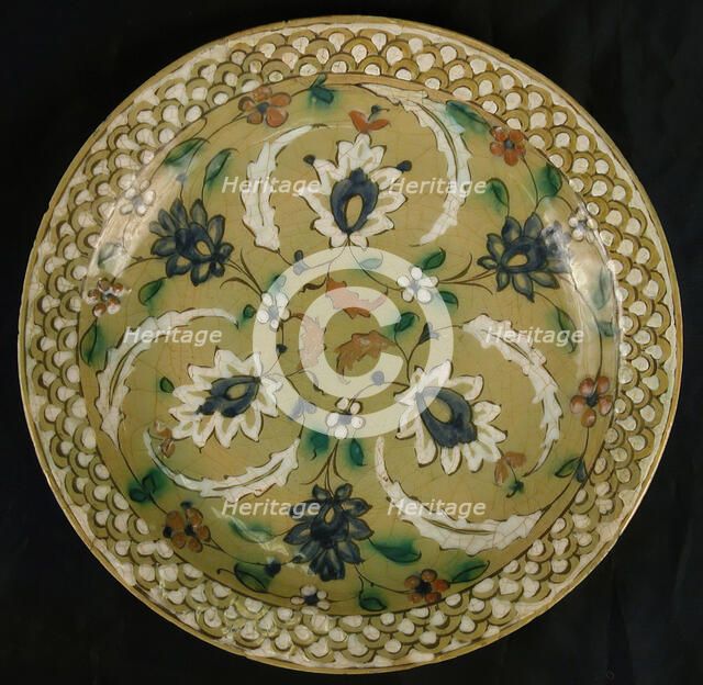 Dish with Floral Designs on an Olive Background, Iran, 16th-17th century. Creator: Unknown.
