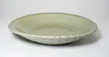 Dish with Floral Scrolls and Foliate Rim, Yuan dynasty (1271-1368) or Ming dynasty (1368-1644). Creator: Unknown