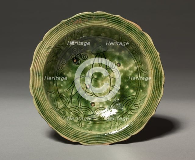 Dish with Incised Design of a Rider on a Mule: Oribe Ware, c. 1600. Creator: Unknown.
