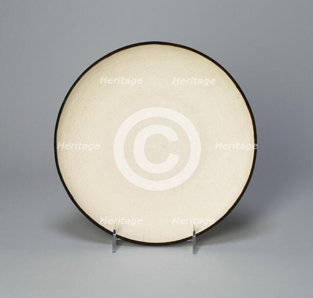 Dish with with Lotus, Saggataria, Mallow, and..., Northern Song dynasty/Jin dynasty, early 12th cent Creator: Unknown.