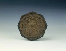 Dish in the shape of a bronze mirror, Qing dynasty, China, 1644-1911. Creator: Unknown