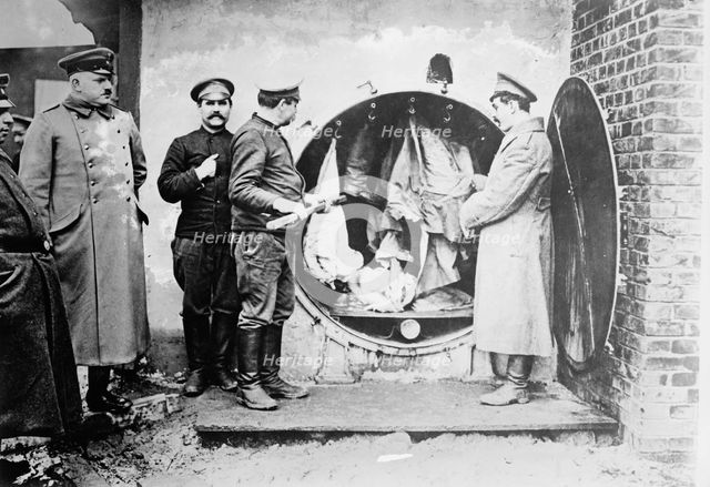 Disinfecting clothing of Russian prisoners, between 1914 and c1915. Creator: Bain News Service.