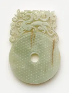 Disk (bi) with knobs, feline and dragon, Eastern Han dynasty, 100-220. Creator: Unknown