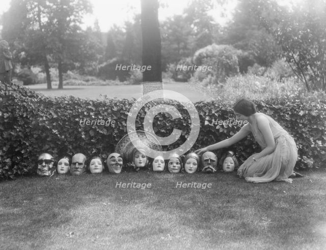 Display of masks made by W.T. Benda, not before 1925 Sept. 20. Creator: Arnold Genthe.