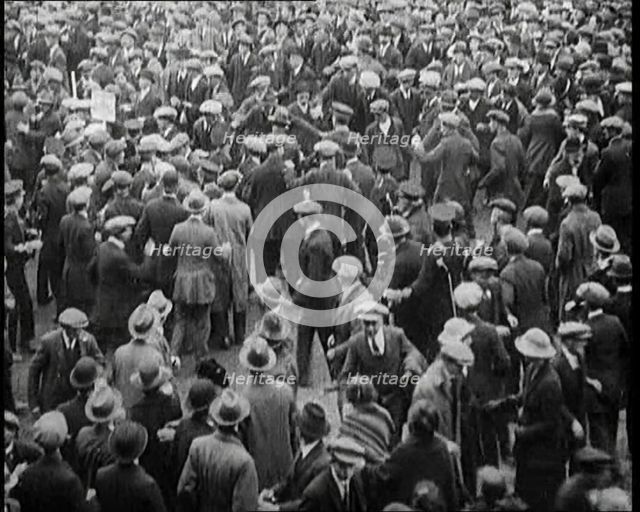 Disruptions and Fighting Breaking Out in the Crowd During a Speech by the Irish Chairman..., 1922. Creator: British Pathe Ltd.