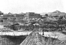 Distant Fronts, At Ouaddai; Goz Beida, capital of Dar Sila..., 1917. Creator: Unknown