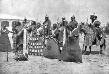 Distant Fronts, In Cameroon; Escort of the lamido of Rey Bouba,..., 191 Creator: Unknown