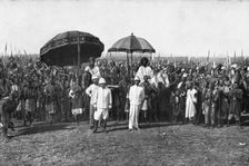 Distant Fronts, In Cameroon; Two sultans and their retinue bid farewell to Colonel Brisset..., 1917. Creator: Unknown
