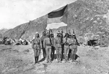 Distant Fronts, In Hejaz; Flag of the Independent Kingdom of Hejaz, 1917. Creator: Unknown