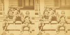 Distinguished southerners, grinding cane. [Children chewing sugar cane on the porch], (1868-1900?). Creator: Unknown