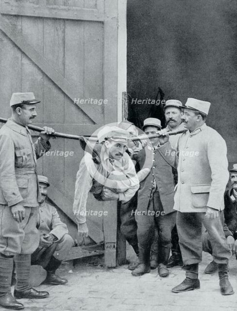 Distractions at the front; the 'human serpent', France, World War I,1915. Artist: Unknown