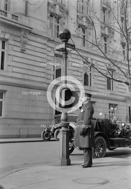 District of Columbia - Fire Alarm Box And Policeman, 1913. Creator: Harris & Ewing.