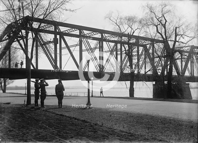 District of Columbia Parks - Guards in Potomac Park at Railway Bridge, 1917. Creator: Harris & Ewing.