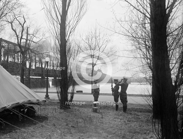 District of Columbia Parks - Guards in Potomac Park at Railway Bridge, 1917. Creator: Harris & Ewing.