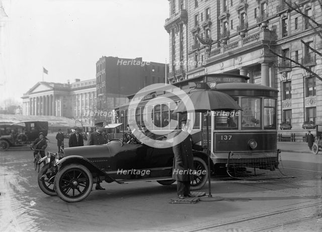 District of Columbia; Traffic. Stop And Go Signs, 1913. Creator: Harris & Ewing.