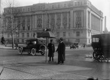 District of Columbia; Traffic. Stop And Go Signs, 1913. Creator: Harris & Ewing