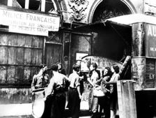 Distributing furniture confiscated from Jews to victims of Allied bombing, Paris, 1943-1944
