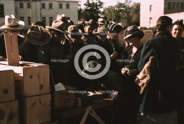 Distributing surplus commodities, St. Johns, Ariz., 1940. Creator: Russell Lee.