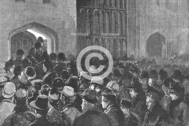 ''Distributing the Queen's New Year Gifts at Windsor; The crowd outside the Riding School...', 1890. Creator: Unknown.