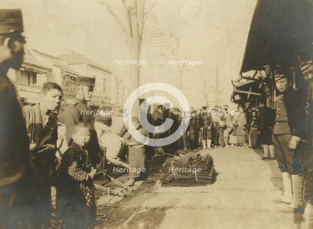 Distribution of blankets to troops at Tokio, c1904. Creator: Unknown.