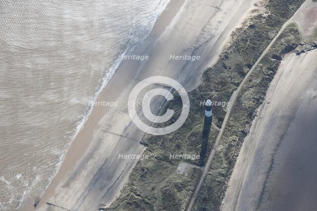 Disused lighthouse and remains of the coastal battery, Spurn Point, East Riding of Yorkshire, 2014.. Creator: Historic England Staff Photographer.