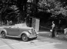 DJH Currie's Ford V8, winner of a silver award at the MCC Torquay Rally, July 1937. Artist: Bill Brunell