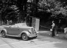 DJH Currie's Ford V8, winner of a silver award at the MCC Torquay Rally, July 1937. Artist: Bill Brunell