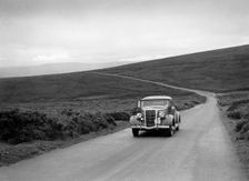 DJH Currie's Ford V8, winner of a silver award at the MCC Torquay Rally, July 1937. Artist: Bill Brunell