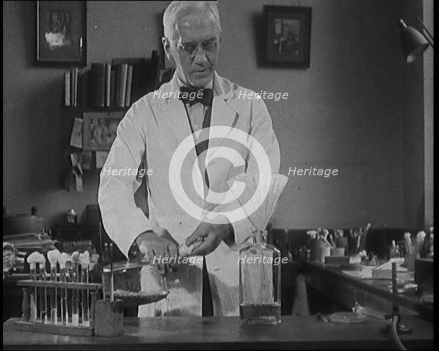 Dr Alexander Fleming, the Inventor of Penicillin, Experimenting in a Laboratory, 1929. Creator: British Pathe Ltd.