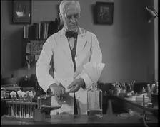 Dr Alexander Fleming, the Inventor of Penicillin, Experimenting in a Laboratory, 1929. Creator: British Pathe Ltd