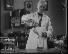 Dr Alexander Fleming, the Inventor of Penicillin, Experimenting in a Laboratory, 1929. Creator: British Pathe Ltd