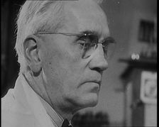 Dr Alexander Fleming, the Inventor of Penicillin, Experimenting in a Laboratory, 1929. Creator: British Pathe Ltd