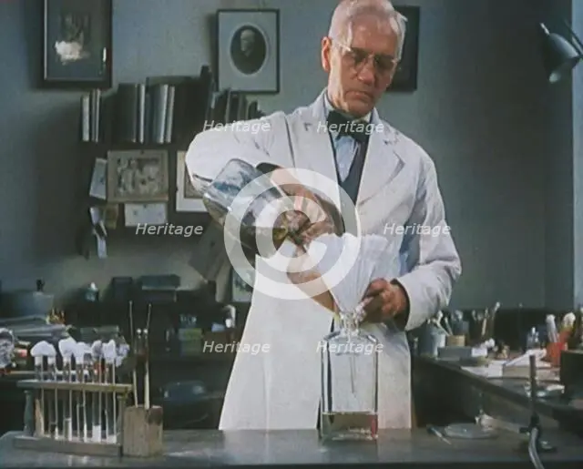 Dr Alexander Fleming, the Inventor of Penicillin, Experimenting in a Laboratory, 1929. Creator: British Pathe Ltd.