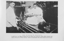 Dr. Floyd W. Willis; A peep-in at an X-ray examination in the offices of Dr. Floyd W..., 1925. Creator: Unknown