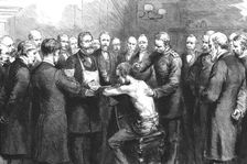 'Dr. Koch's Treatment for Consumption at the Royal Hospital, Berlin; Professor Pfuhl Innoculating a Creator: Unknown