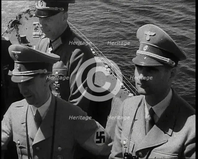 Dr Josef Goebbels, Rudolf Hess, and German Officer on Board an Italian Battleship, 1937. Creator: British Pathe Ltd.