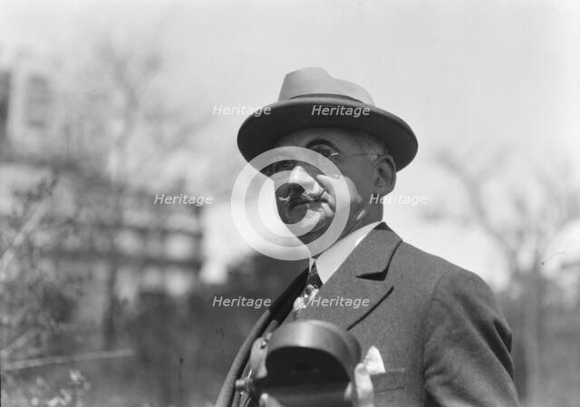 Dr. Maximilian Toch, standing outdoors, 1936. Creator: Arnold Genthe.