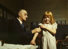 Dr. Schreiber of San Augustine giving a typhoid innoculation..., San Augustine County, Texas, 1943. Creator: John Vachon