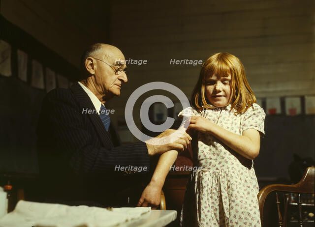 Dr. Schreiber of San Augustine giving a typhoid innoculation..., San Augustine County, Texas, 1943. Creator: John Vachon.