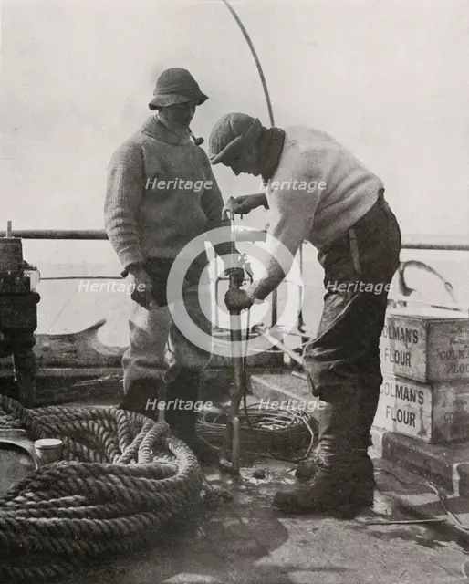 'Dr. Wilson and Dr. Atkinson Loading The Harpoon Gun', c1910–1913, (1913). Artist: Herbert Ponting.