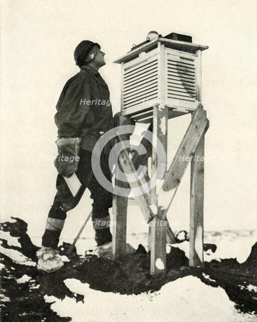 'Dr. Wilson Watching the First Rays of Sunlight Being Recorded', c1911, (1913). Artist: Herbert Ponting.