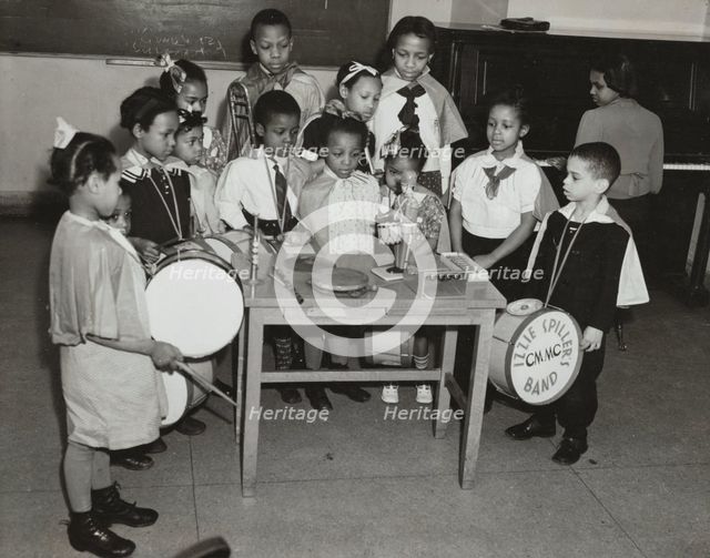 Drum students around a table, 1938. Creator: Unknown.