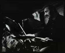 Drummer Alan Jackson playing at The Stables, Wavendon, Buckinghamshire. Creator: Denis Williams