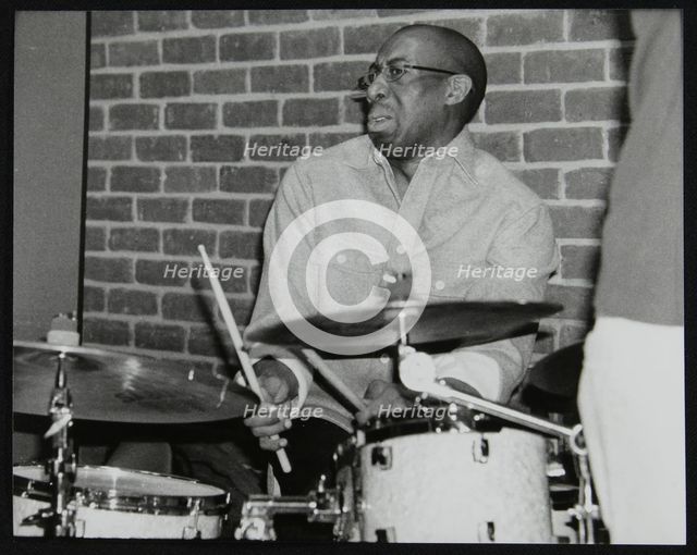 Drummer Rod Youngs playing at The Fairway, Welwyn Garden City, Hertfordshire, 25 January 2004. Creator: Denis Williams.