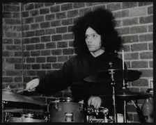 Drummer Seb Rochford playing at The Fairway, Welwyn Garden City, Hertfordshire, 8 April 2001. Creator: Denis Williams