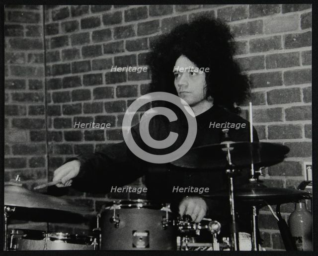 Drummer Seb Rochford playing at The Fairway, Welwyn Garden City, Hertfordshire, 8 April 2001. Artist: Denis Williams