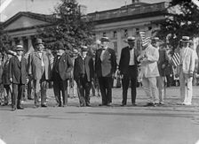 Draft Parade - Senators: Chamberlain; J.H. Bankhead; Knute Nelson; Hardwick; Warren; Lodge..., 1917. Creator: Harris & Ewing