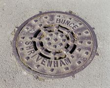 Drain cover plate made by Bunce of Shrivenham, Swindon, Wiltshire, 2006. Artist: Peter Williams