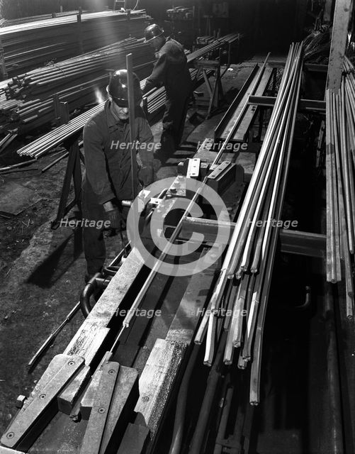 Drawing hexagonal rods, Edgar Allen Steel Foundry, Sheffield, 1962.  Creator: Michael Walters.